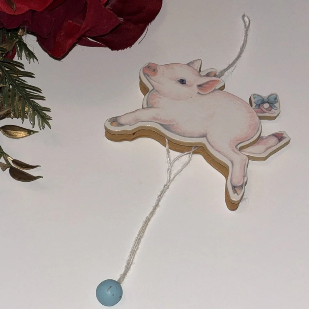 Flying Pig ornament Midwest Importers Canon Falls Wooden Pull String Toy
